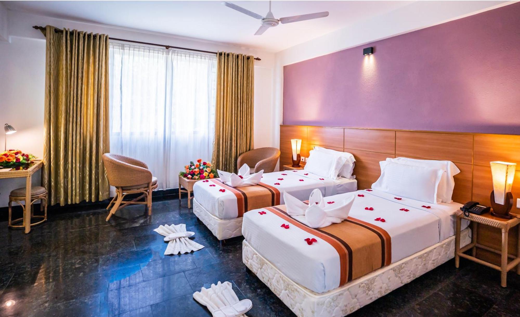 טקאדי Peppervine Hotel חדר תמונה