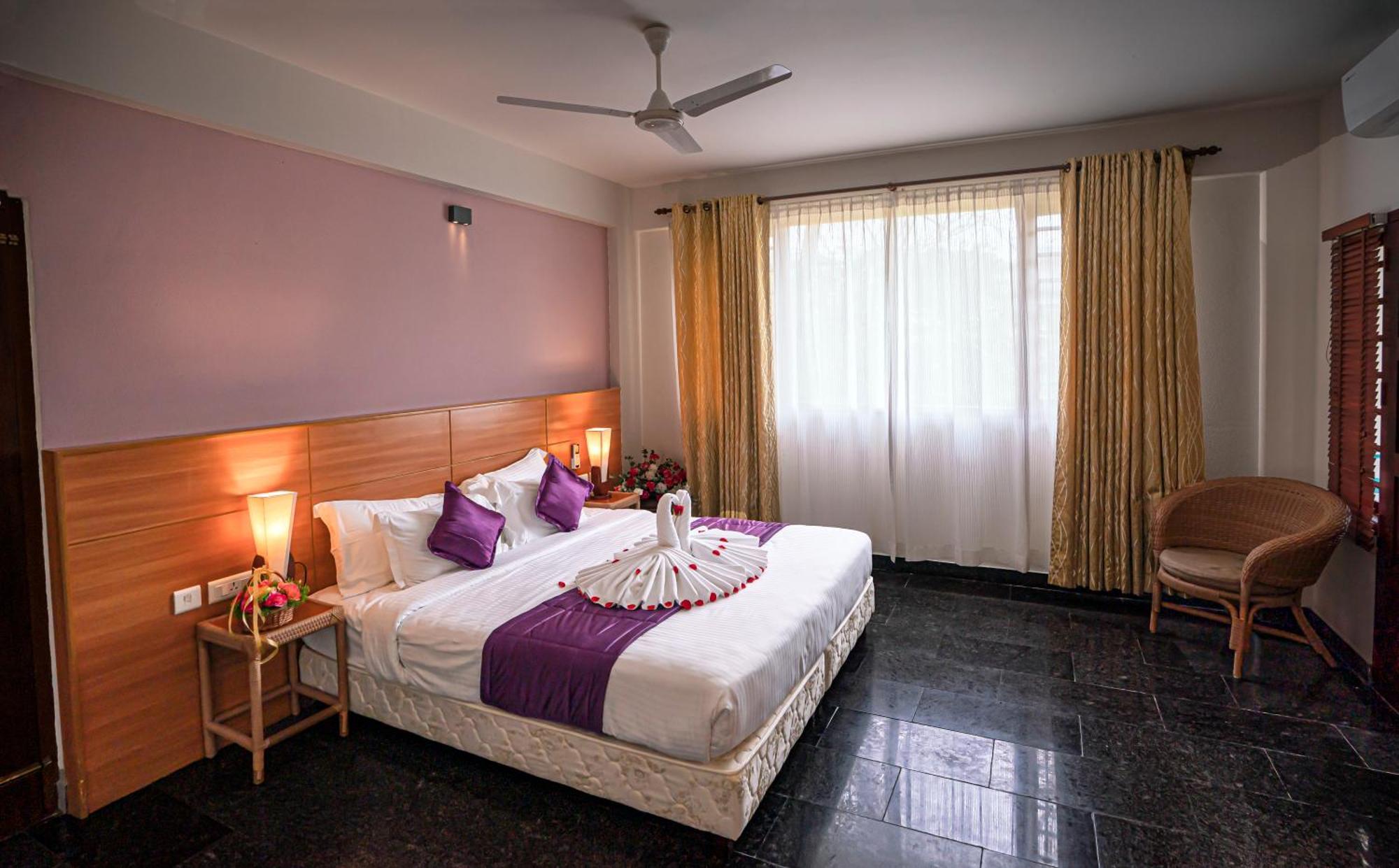 טקאדי Peppervine Hotel חדר תמונה